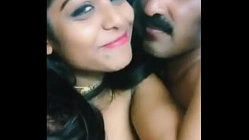 indian flashes her tits and plays with a cock
